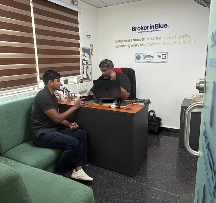 BrokerInBlue consultation inside the Manyata Tech Park office
