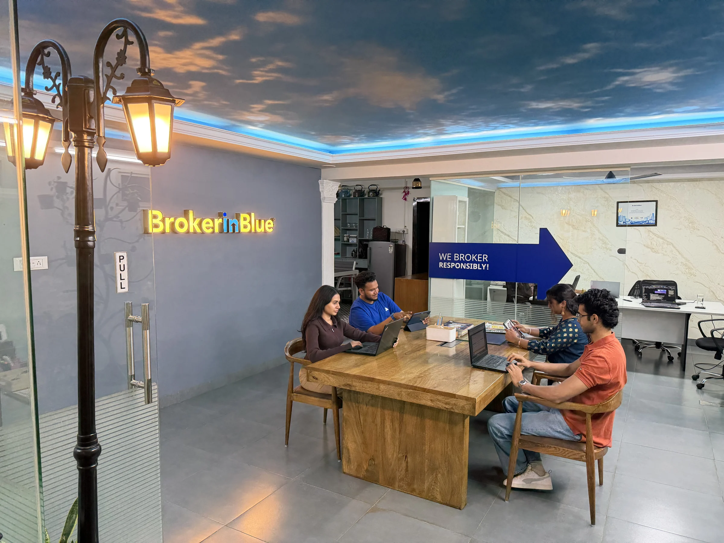 BrokerInBlue team working inside the RMV 2nd Stage office