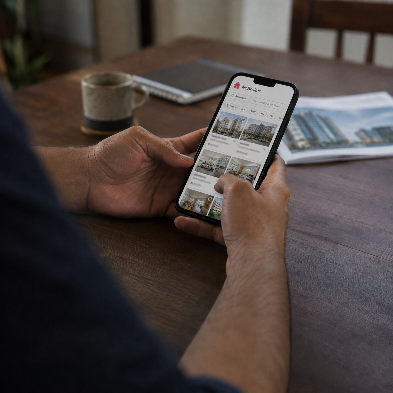 Person browsing online property listings on a smartphone